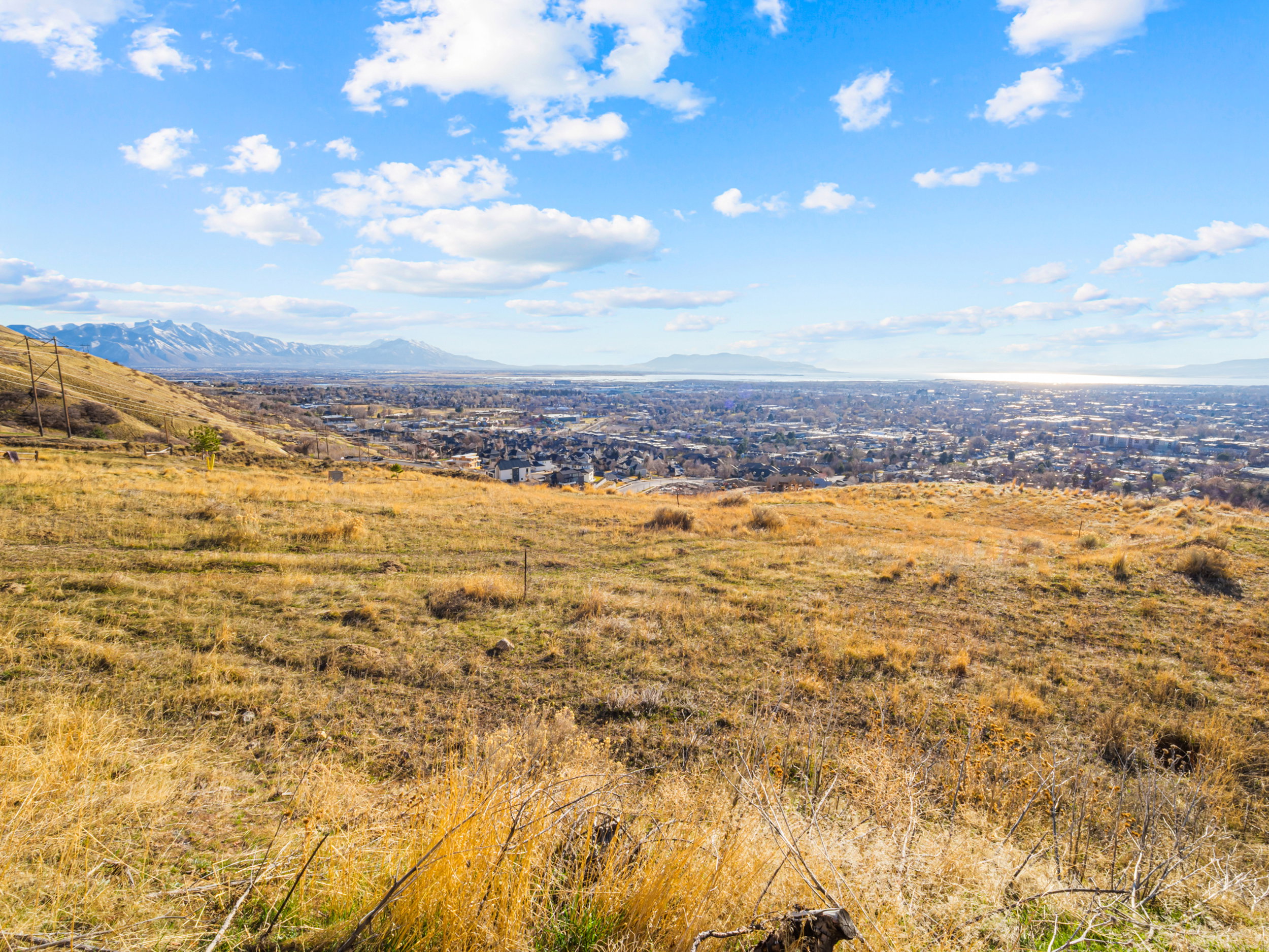 View of mountain backdrop with rural landscape