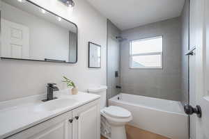 Full bathroom with vanity and bathtub / shower combination