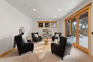 Sitting room featuring carpet and recessed lighting