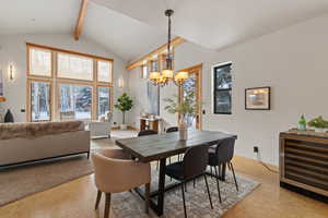 Dining area with wine cooler and a chandelier
