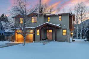 View of front of home featuring stucco siding