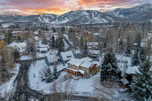 Snowy aerial view with a mountain view