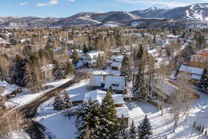 Snowy aerial view with a mountain view
