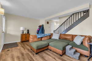 Family room with new LVP floors and fireplace