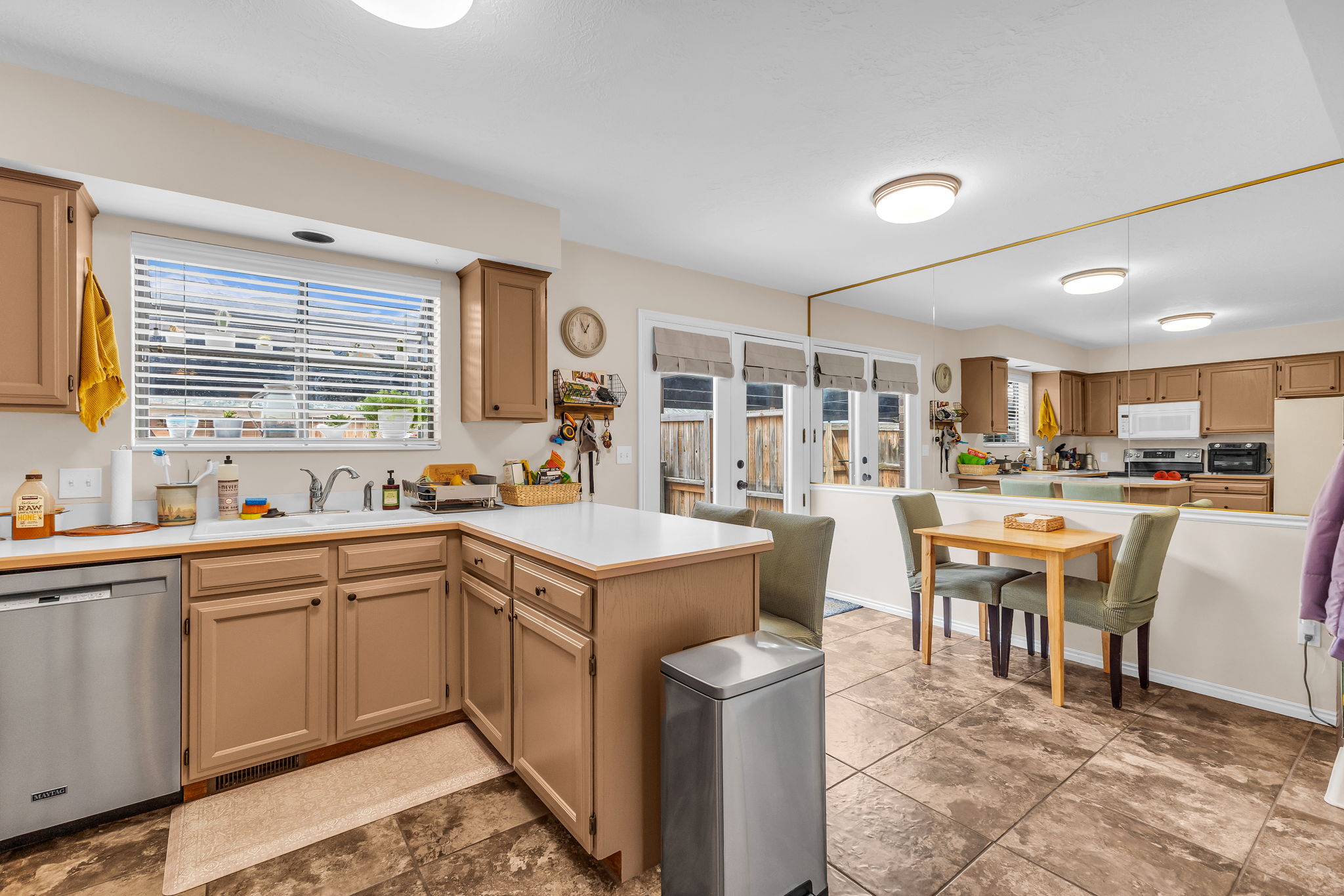 Kitchen with newly finished cabinets and new lighting