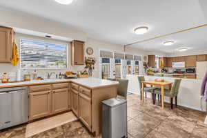 Kitchen with newly finished cabinets and new lighting