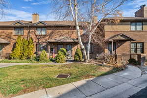 All brick exterior front of home