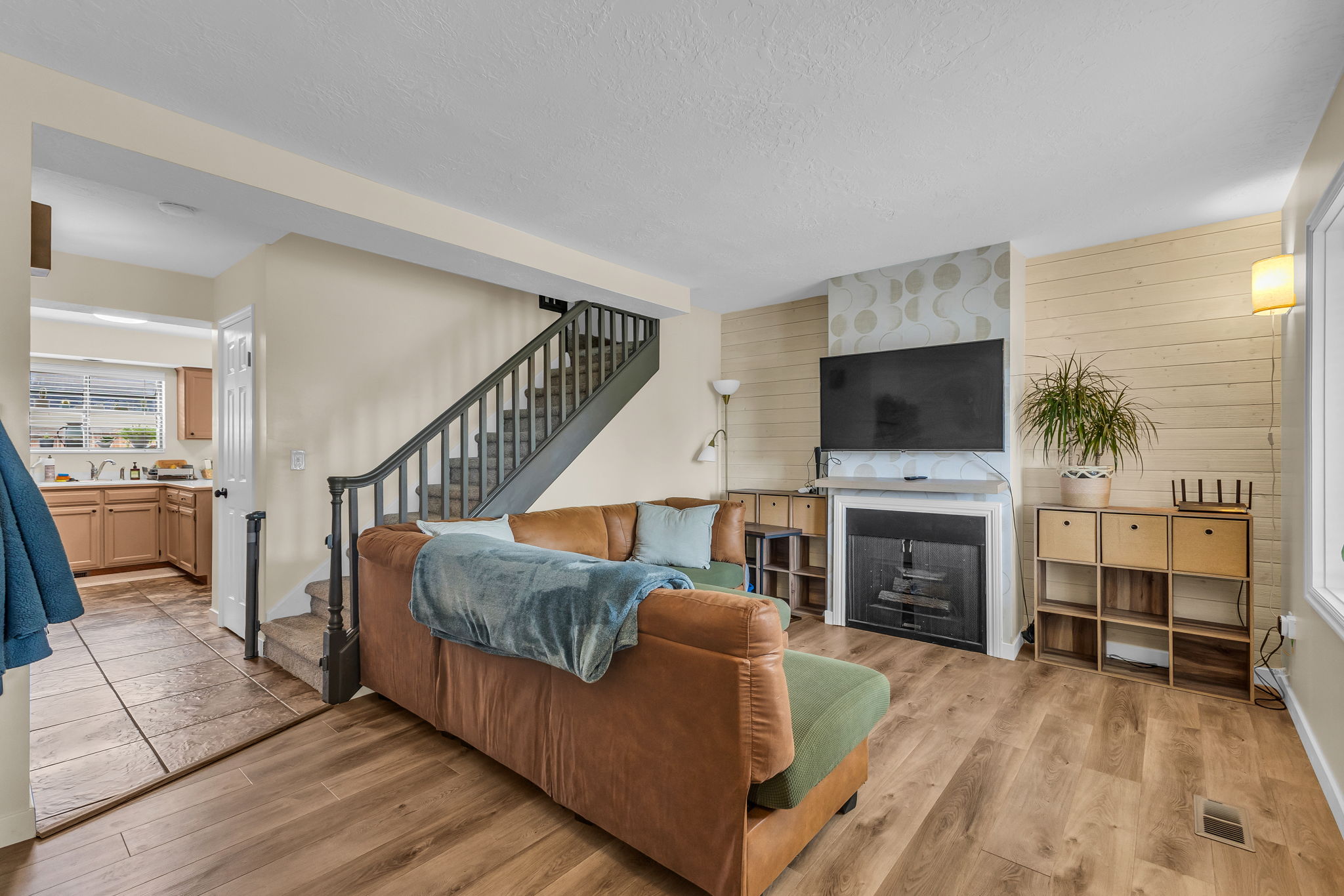 Family room with new LVP floors and fireplace