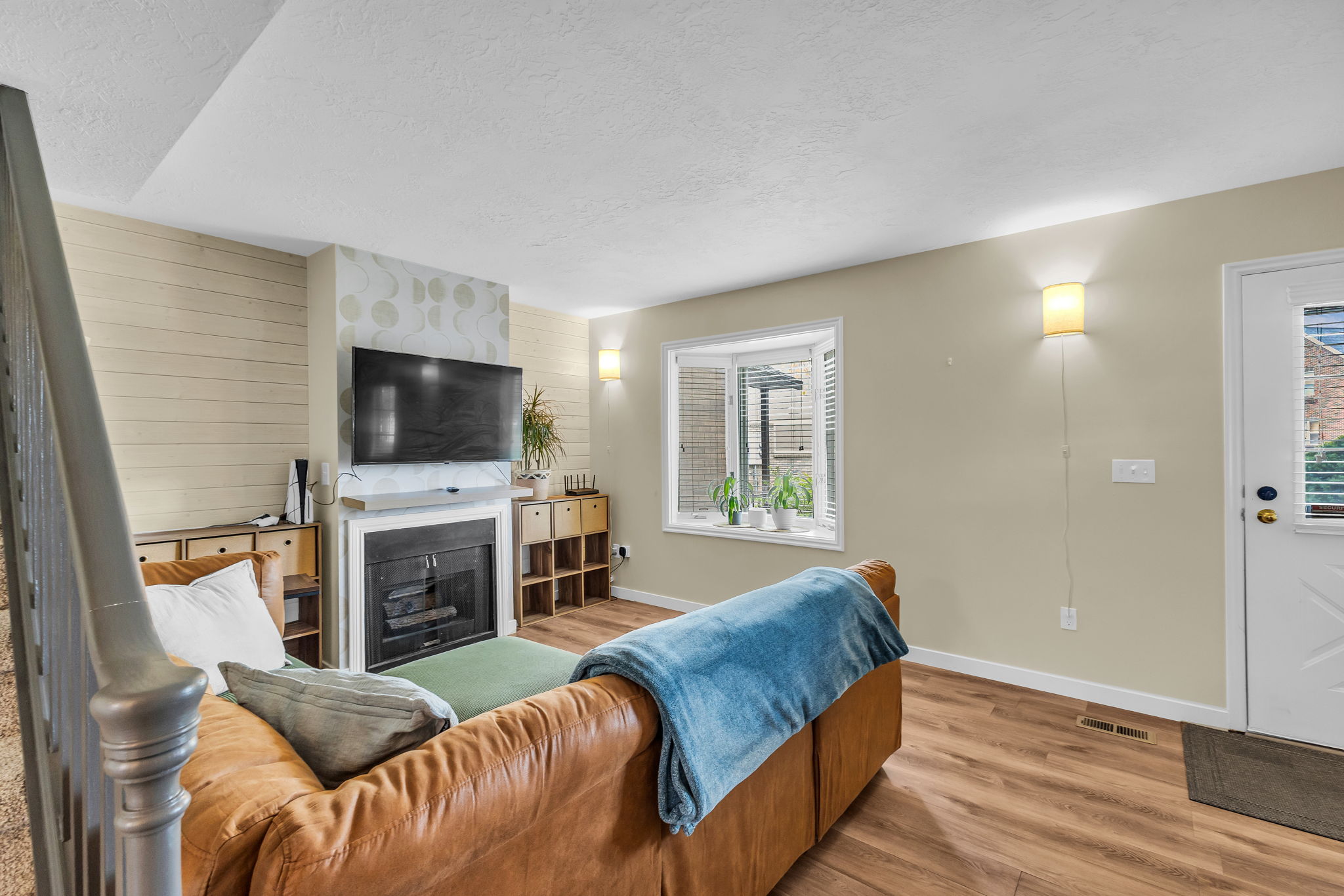 Family room with new LVP floors and fireplace