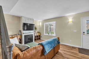 Family room with new LVP floors and fireplace