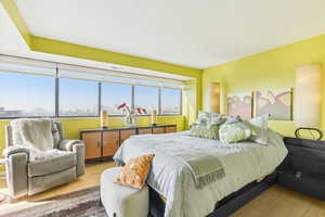 Bedroom with wood finished floors