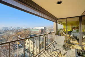 Balcony featuring a view of skyline