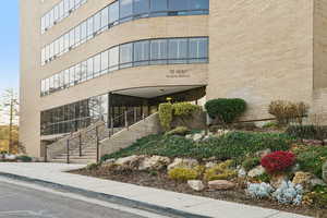 View of apartment building / complex with stairs