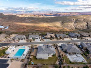 Drone / aerial view of mountains and a pool area