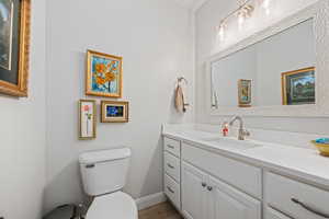 Bathroom with vanity and toilet