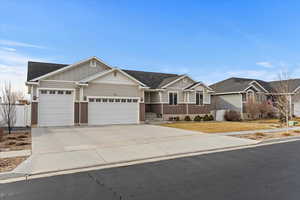 Abundant parking space! 4 car garage and large driveway