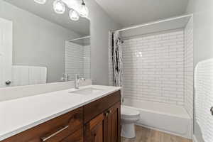 Quartz countertop and tile shower