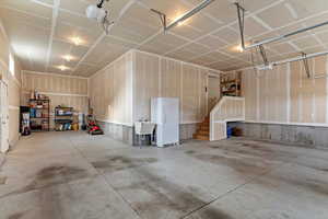 Oversized four-car garage with a utility sink