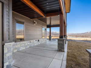 View of patio / terrace featuring a mountain view