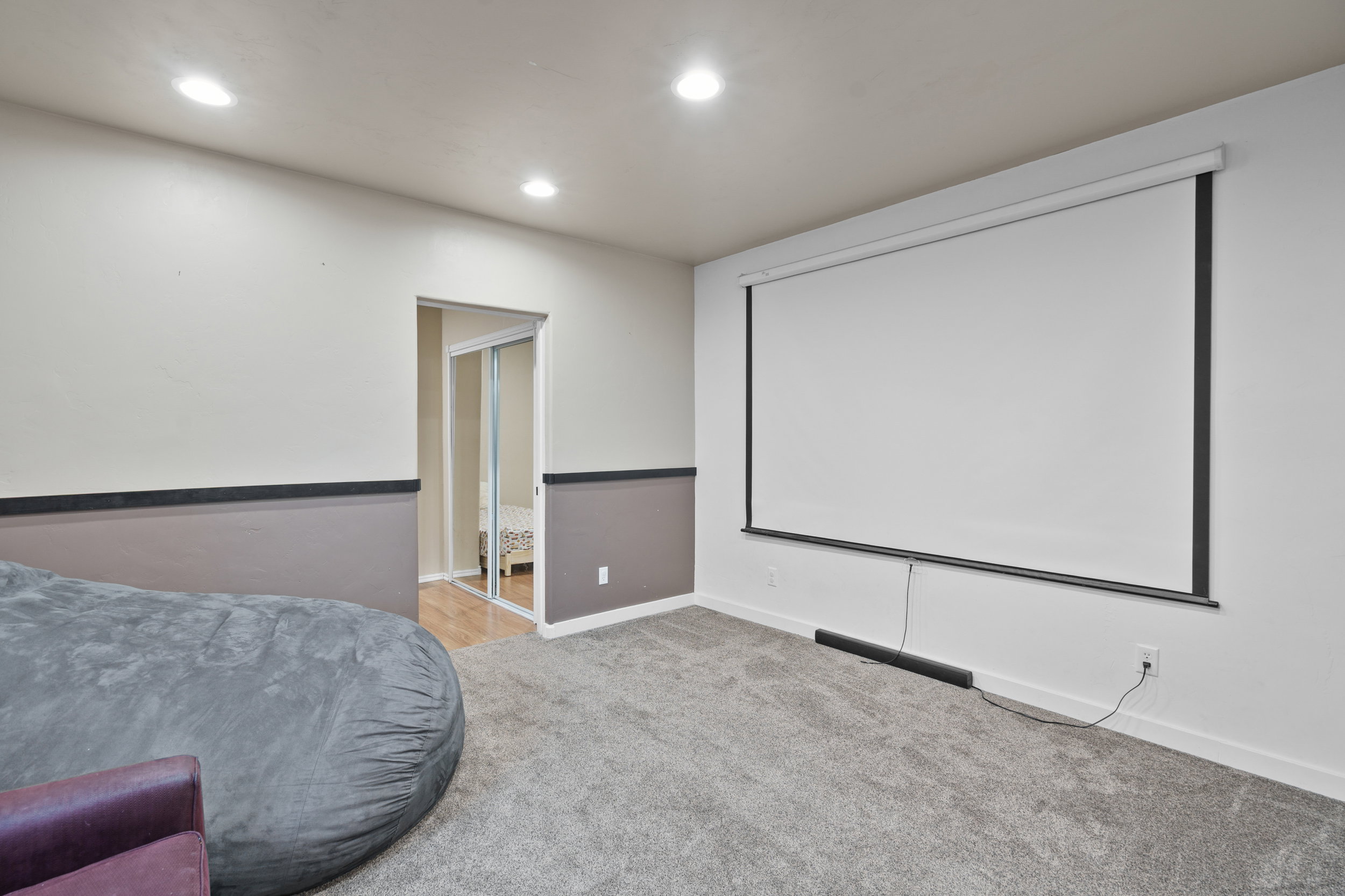 Use this as a 2nd bedroom or a Theatre room. Carpeted cinema featuring recessed lighting and baseboards