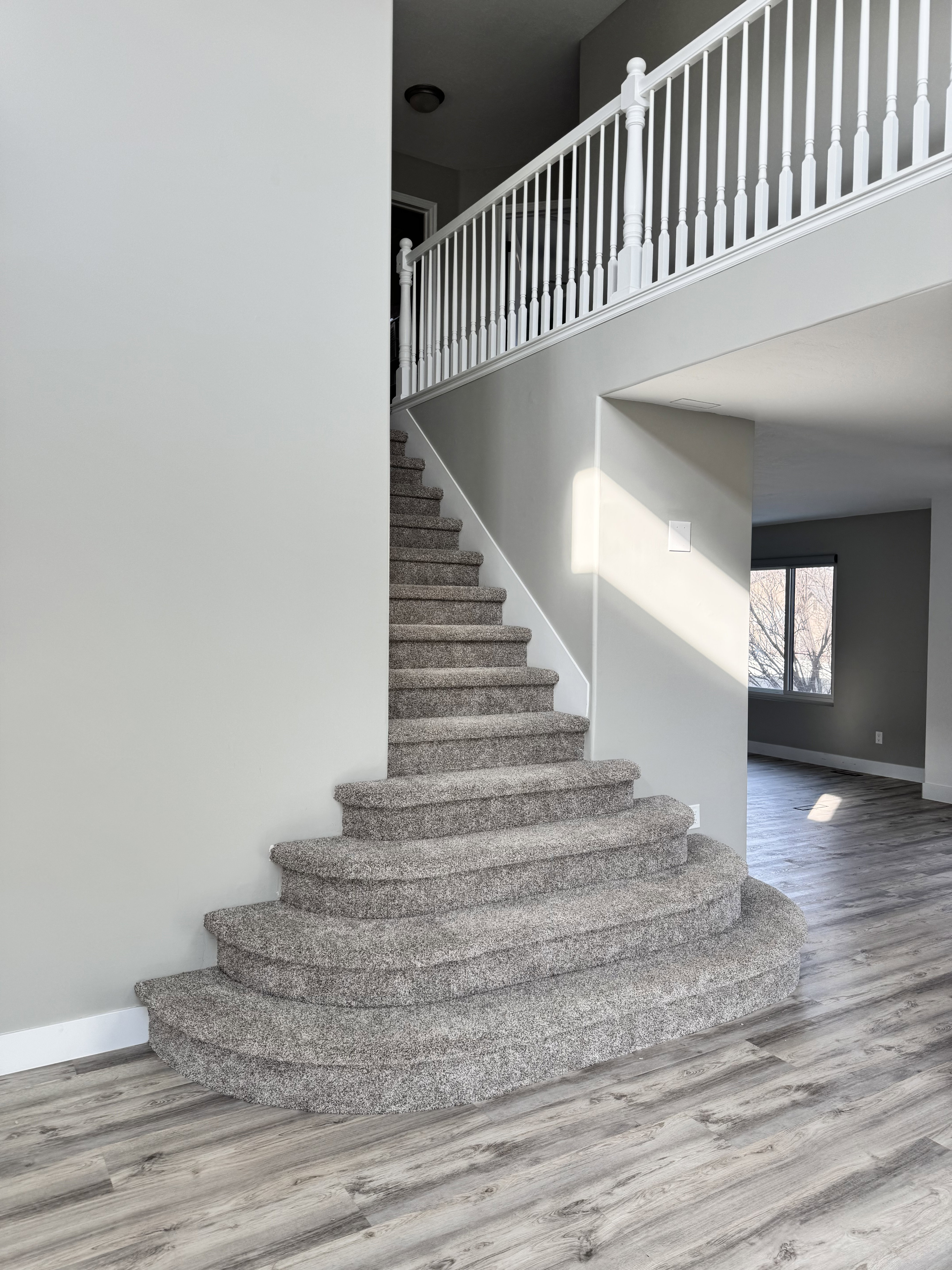 Staircase leading to the upstairs or second floor.