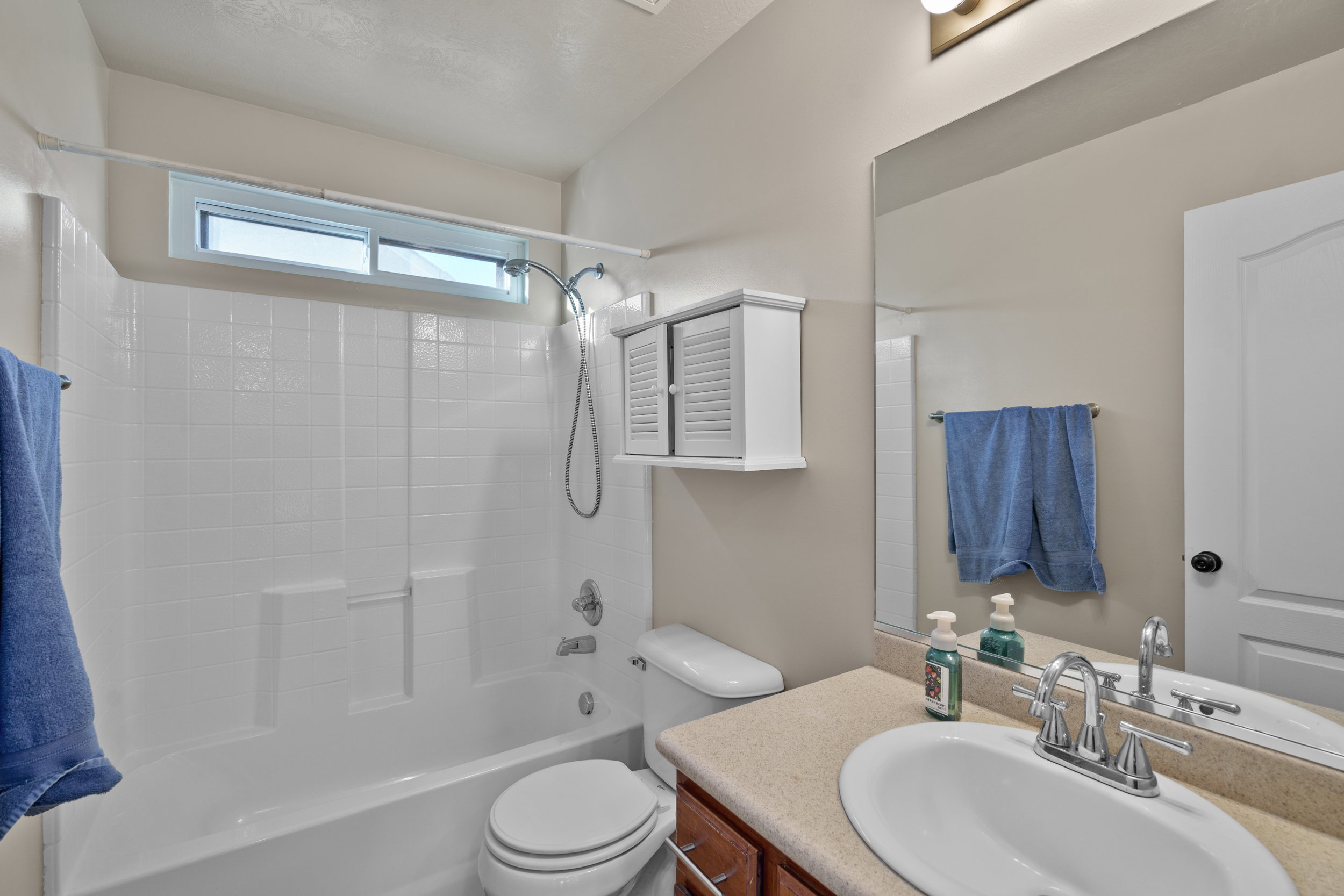 Upstairs Full bath with vanity and shower / bath combination