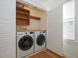 Laundry area with built-ins. Washer & dryer included.