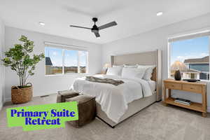 Bedroom with carpet, multiple windows, a ceiling fan, a water view, and recessed lighting