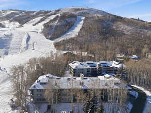 Snowy aerial view with a mountain view