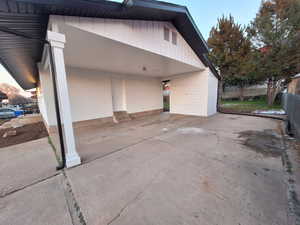 View of property exterior with brick siding
