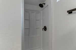 Bathroom view of a stall shower