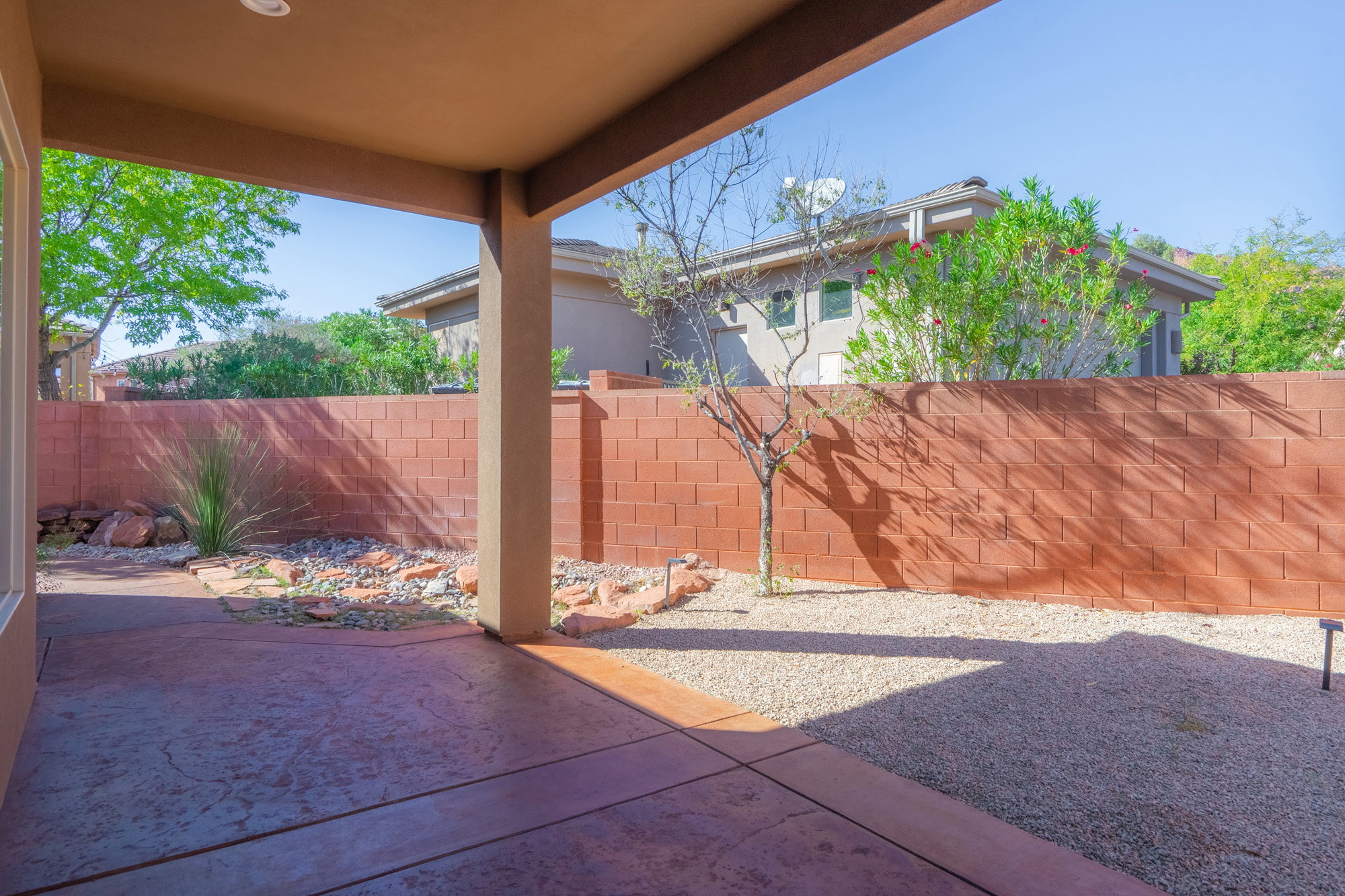 Fenced backyard featuring a patio area