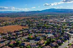 Aerial perspective of suburban area featuring mountains