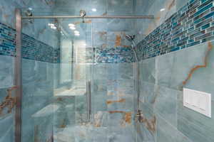 Full bathroom with a stall shower