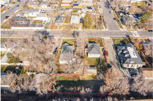 Aerial perspective of suburban area featuring property parcel outlined