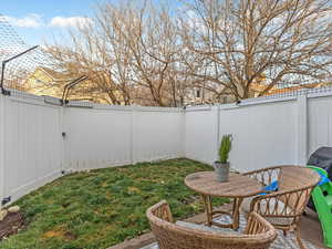 Fenced backyard featuring a patio area