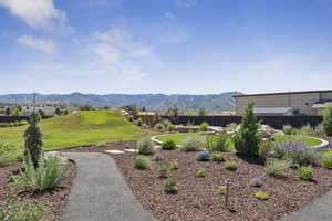 Surrounding community featuring a mountain view
