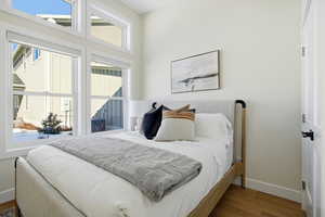 Bedroom with wood finished floors