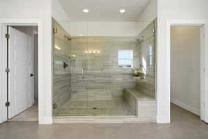 Bathroom featuring a stall shower and tile patterned floors