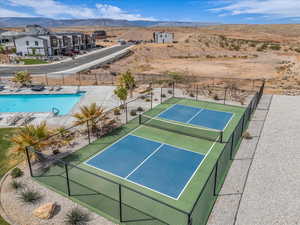View of tennis court featuring a mountain view
