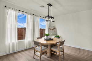Dining room featuring light wood-style flooring
