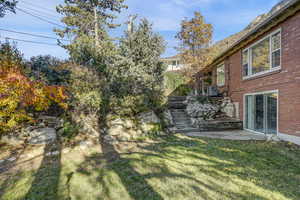 View from the west of back yard, patio and stairs