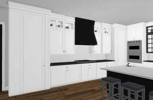 Kitchen with range hood, a breakfast bar area, white cabinetry, and double wall oven