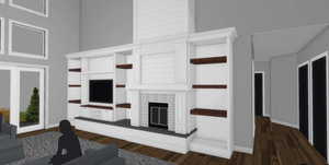 Living area featuring a towering ceiling, dark wood finished floors, and a fireplace