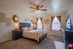Bedroom featuring carpet floors and a ceiling fan