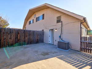 Rear view of property featuring a patio