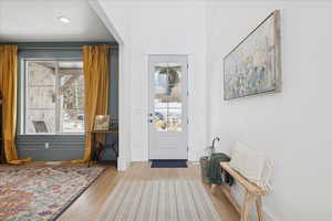 Entryway featuring hardwood / wood-style flooring and recessed lighting