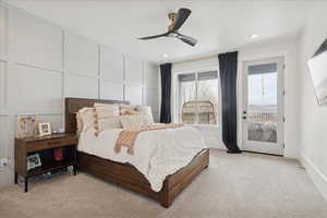 Bedroom with a decorative wall, light carpet, ceiling fan, access to outside, and recessed lighting