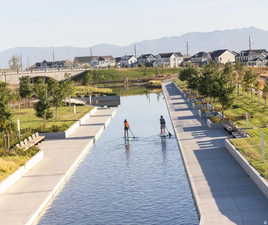 View of property's community with a residential view and a water and mountain view