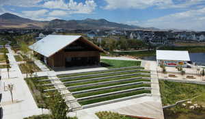 View of mountain background featuring nearby suburban area